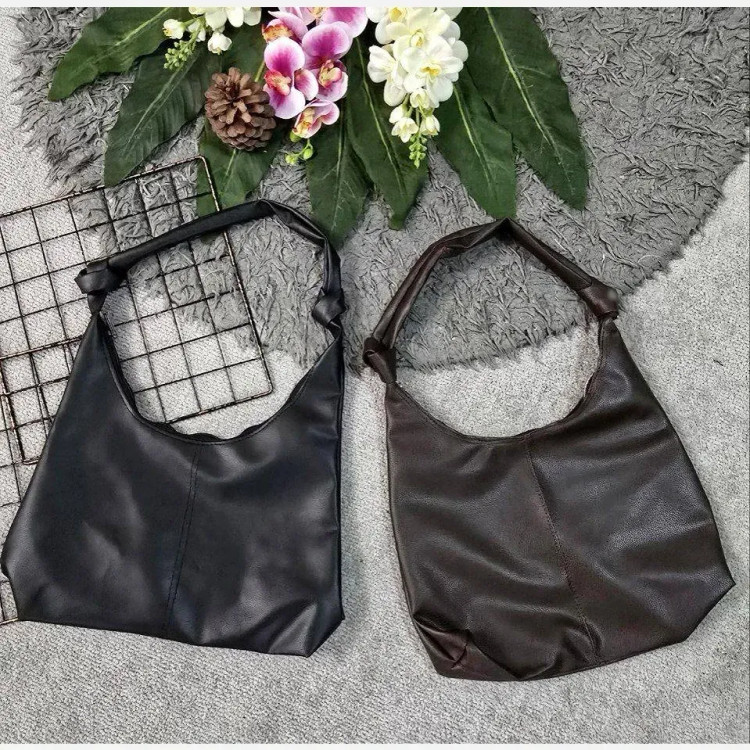کیف دوشی زنانه چرمی بند گره ای مدل سبک و جادار ابعاد 30 در 40 سانتی متر