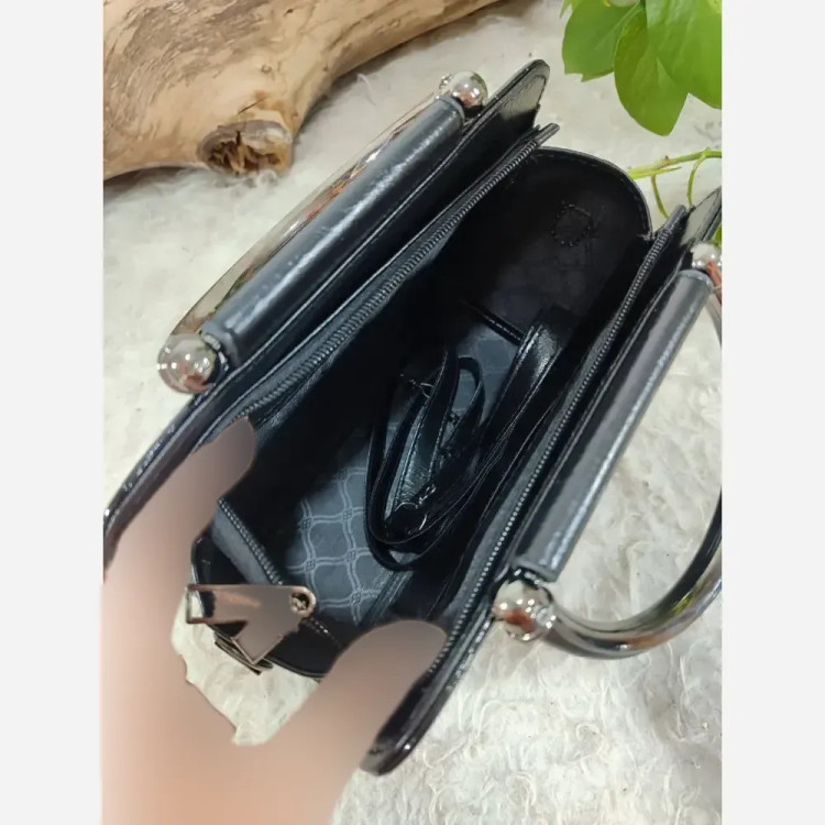 کیف مجلسی زنانه مدل اهو جنس ورنی درجه یک ابعاد 19 در 25 سانتیمتر