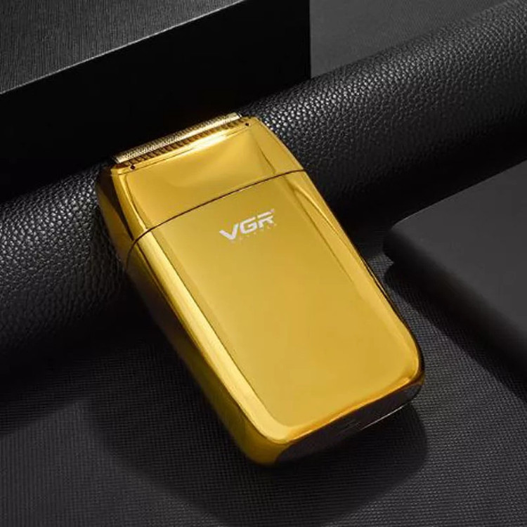 ماشین اصلاح موی صورت وی جی آر مدل V-399 با تیغه استیل پیشرفته، تکنولوژی شیو فویلی، باتری لیتیوم یونی 700mAh، استفاده خشک و مرطوب، شارژ سریع 180 دقیقه، عمر باتری 200 دقیقه، مقاوم در برابر آب و سبک