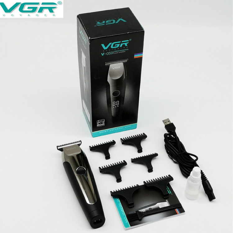 ماشین اصلاح موی صورت و بدن وی جی ار مدل V-059 با تیغه استیل ضد زنگ خودتیز شونده، باتری لیتیوم یونی با 150 دقیقه زمان استفاده، نمایشگر دیجیتال، تنظیم سرعت 3 مرحلهای و 6 عدد شانه سایز 1 تا 6 میلیمتر