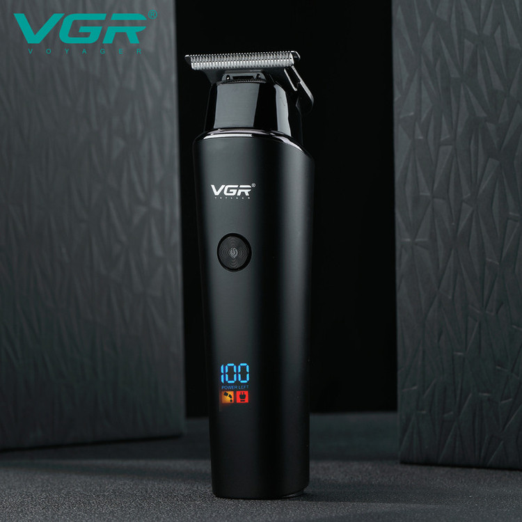 ماشین اصلاح موی سر و صورت وی جی آر مدل 937 با طراحی ارگونومیک، نمایشگر دیجیتال، باتری 2000 میلیآمپر ساعت، شارژ USB و سه شانه قابل تنظیم برای اصلاح دقیق و چند حالته