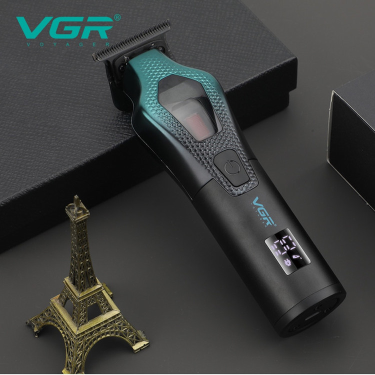 ماشین اصلاح موی سر و صورت وی جی ار مدل V-997 با موتور 11000 دور در دقیقه، باتری لیتیوم یونی 2500 میلیآمپر ساعت، تیغه سرامیک ضد التهاب، قابلیت تنظیم سرعت و نمایشگر میزان شارژ