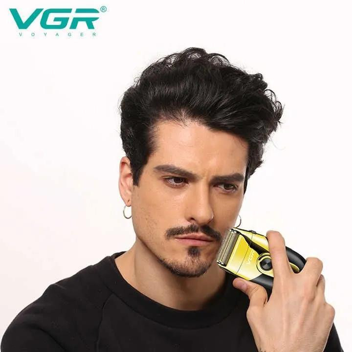 ماشین اصلاح موی صورت وی جی ار مدل V-383 با تیغه استیل پیشرفته، اصلاح فویلی صفر زن، ضد آب، باتری قابل شارژ با 60 دقیقه استفاده، شارژ 90 دقیقه، وزن 550 گرم