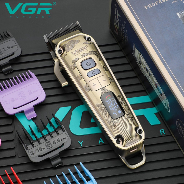 ماشین اصلاح موی سر و صورت وی جی آر مدل V-005 با تیغه کربن استیل و متالوژیک پودری، باتری لیتیومی 2600 میلیآمپر، نمایشگر LED، قابلیت تنظیم سرعت و 8 شانه اندازهگیری از 1.5 تا 19 میلیمتر، مدت استفاده 250 دقیقه پس از شارژ کامل