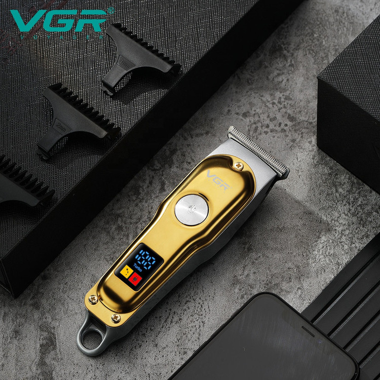 ماشین اصلاح موی صورت و بدن وی جی ار مدل V_290 با تیغه کروم و تیتانیوم خودتیز شونده، باتری لیتیوم یونی شارژی با 120 دقیقه استفاده، قابلیت تنظیم سرعت و وزن 120 گرم