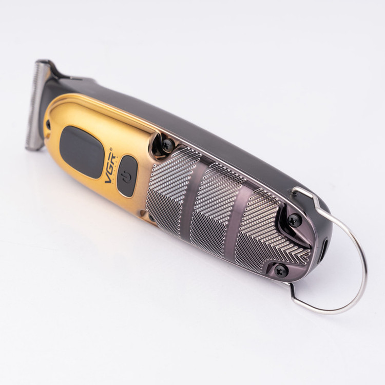 ماشین اصلاح موی صورت وی جی ار مدل V-981 با تیغه استیل ضد زنگ، عملکرد توربو، طراحی ارگونومیک، شارژ سریع 90 دقیقه و استفاده 150 دقیقه، دارای نمایشگر LED و 3 شانه اصلاح 1، 2 و 3 میلیمتری