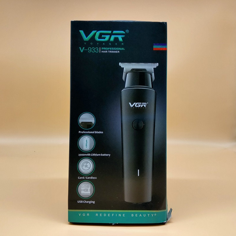 ماشین اصلاح موی سر و صورت وی جی ار مدل V-933 با تیغه استیل پیشرفته، اصلاح خط زن و حجم زن، قابلیت استفاده خشک و مرطوب، باتری قابل شارژ با 500 دقیقه کارکرد و چهار شانه تنظیم اندازه اصلاح 0.5 تا 2 میلیمتر