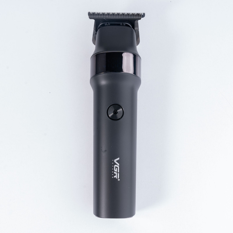 ماشین اصلاح موی سر و صورت وی جی آر مدل V-987 با تیغه سرامیکی و استیل ضد زنگ، موتور دی سی 7000 دور در دقیقه، عملکرد توربو، باتری 2000 میلیآمپرساعتی با 400 دقیقه استفاده و صفحه نمایش الایدی میزان شارژ