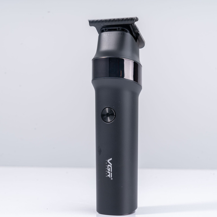 ماشین اصلاح موی سر و صورت وی جی آر مدل V-987 با تیغه سرامیکی و استیل ضد زنگ، موتور دی سی 7000 دور در دقیقه، عملکرد توربو، باتری 2000 میلیآمپرساعتی با 400 دقیقه استفاده و صفحه نمایش الایدی میزان شارژ