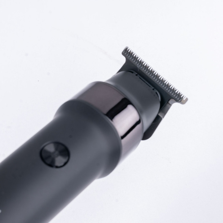 ماشین اصلاح موی سر و صورت وی جی آر مدل V-987 با تیغه سرامیکی و استیل ضد زنگ، موتور دی سی 7000 دور در دقیقه، عملکرد توربو، باتری 2000 میلیآمپرساعتی با 400 دقیقه استفاده و صفحه نمایش الایدی میزان شارژ