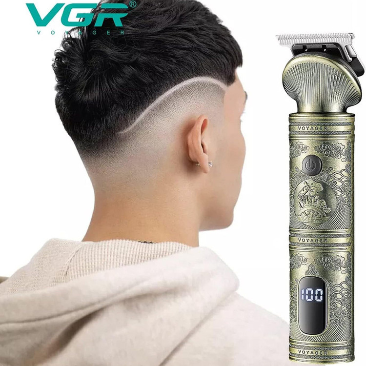ست ماشین اصلاح موی صورت و بدن وی جی ار مدل V-106 با تیغه استیل پیشرفته، قابلیت اصلاح خشک و مرطوب، باتری 1200 میلیآمپر ساعت، شارژ سریع، نمایش وضعیت باتری، طراحی ارگونومیک، همراه با 9 عدد شانه و کیف نگهداری