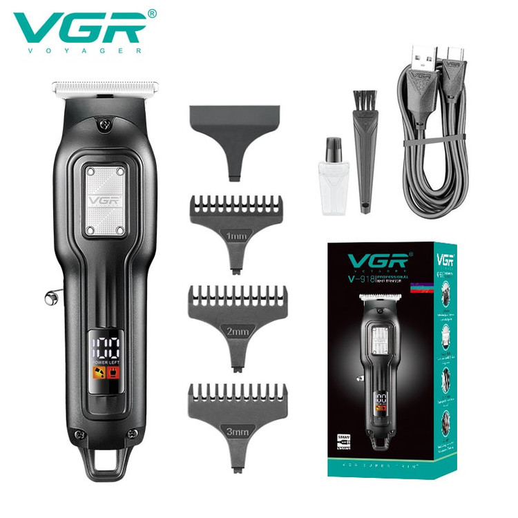 ماشین اصلاح موی سر و صورت شارژی وی جی ار مدل V-918 با تیغه تیتانیوم، قابلیت اصلاح با شماره صفر، نمایشگر میزان شارژ، باتری 600 میلیآمپر ساعت، طراحی ارگونومیک، شانه قابل تنظیم و پورت شارژ USB