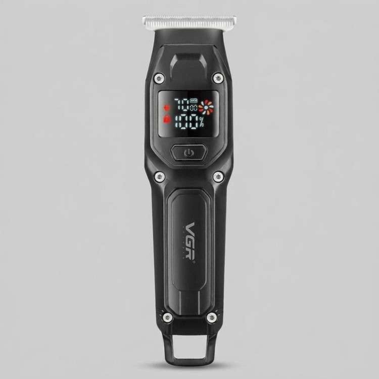 ماشین اصلاح موی سر و صورت وی جی ار مدل V-964 با تیغه کربن استیل، باتری لیتیومی 600 میلیآمپر، نمایشگر وضعیت باتری، عملکرد توربو، طراحی ارگونومیک و 3 شانه خط زن سایز 1، 2 و 3 میلیمتر