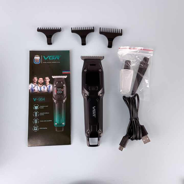 ماشین اصلاح موی سر و صورت وی جی ار مدل V-964 با تیغه کربن استیل، باتری لیتیومی 600 میلیآمپر، نمایشگر وضعیت باتری، عملکرد توربو، طراحی ارگونومیک و 3 شانه خط زن سایز 1، 2 و 3 میلیمتر