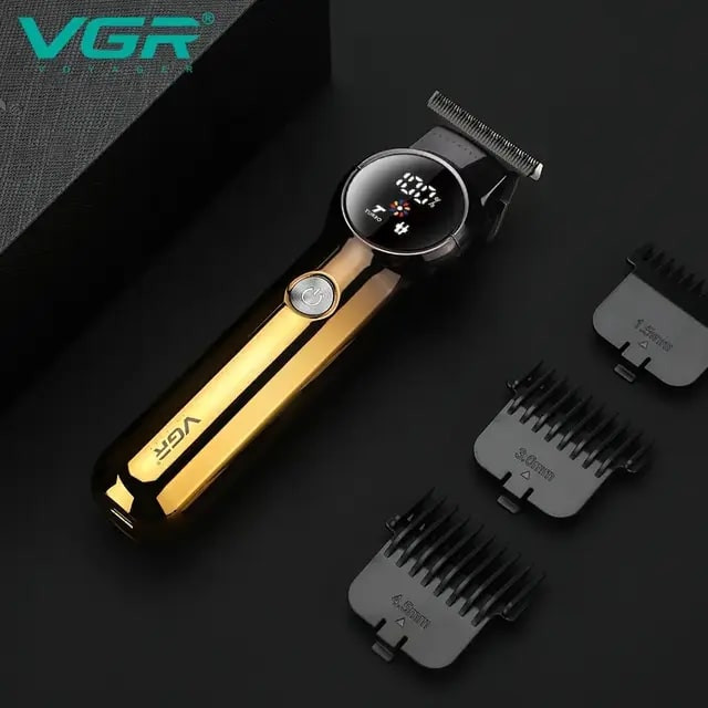 ماشین اصلاح موی سر و صورت وی جی ار مدل 989 با باتری 1200 میلیآمپر ساعت، طراحی ارگونومیک، شانه قابل تنظیم دستی، تیغه تک و شارژ USB