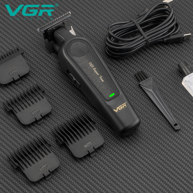 ماشین اصلاح موی سر و صورت وی جی آر مدل V-995 با تیغه کربن استیل، باتری لیتیوم یون 2000 میلیآمپر ساعت، شارژ USB، قابلیت تنظیم سرعت و طراحی ارگونومیک و سبک