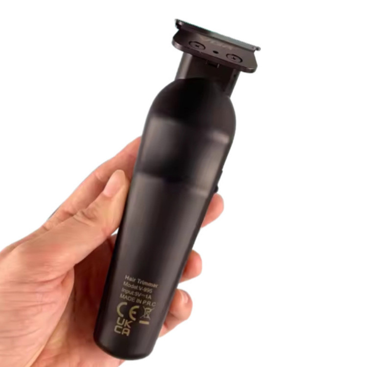 ماشین اصلاح موی سر و صورت وی جی آر مدل V-995 با تیغه کربن استیل، باتری لیتیوم یون 2000 میلیآمپر ساعت، شارژ USB، قابلیت تنظیم سرعت و طراحی ارگونومیک و سبک
