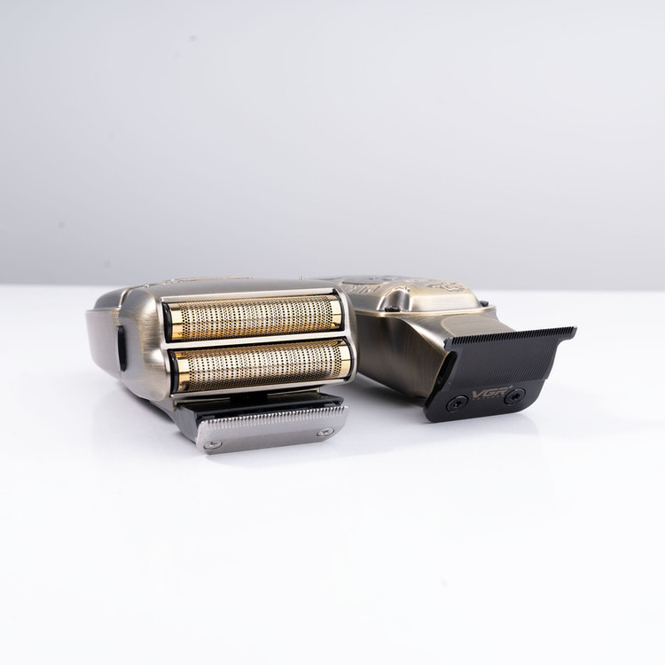ماشین اصلاح موی سر و صورت وی جی ار مدل V-641 با تیغه سرامیکی و تیتانیومی، ضد آب با گواهی IPX6، قابلیت تنظیم سرعت، صفحه نمایش LED، شارژ USB، همراه با 4 شانه اصلاح، برس تمیزکننده، روغن روانکننده و کیف حمل، مجموعه دو عددی