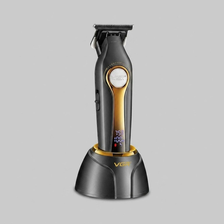 ماشین اصلاح موی سر و صورت وی جی ار مدل V-993 با تیغه سرامیکی، قابلیت اصلاح با شماره صفر، خط زن، نمایشگر میزان شارژ، باتری قابل شارژ، مدت زمان استفاده 180 دقیقه، همراه با 4 عدد شانه