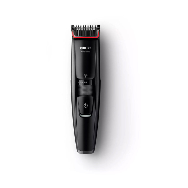 ماشین اصلاح موی صورت فیلیپس مدل BT5200/16 با تیغههای استیل ضدزنگ خود تیزشونده، طول اصلاح 0.4 تا 10 میلیمتر، قابلیت استفاده با باتری و برق، شارژ USB یک ساعته و ضدآب با طراحی ارگونومیک و شانه قابل تنظیم دستی