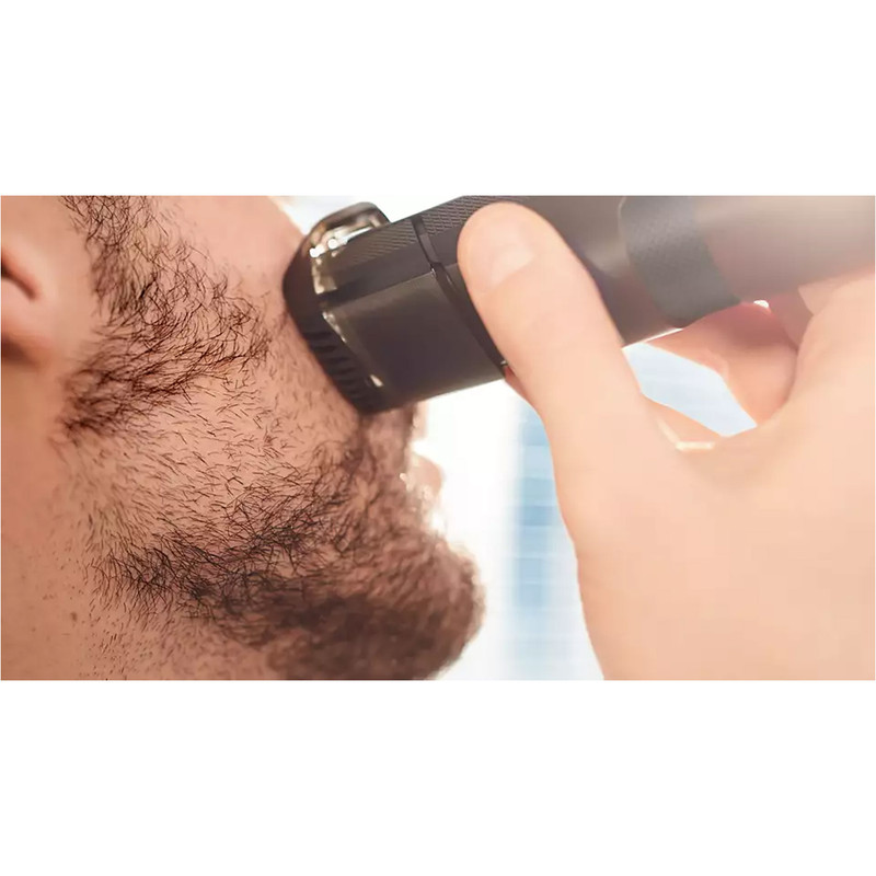 ماشین اصلاح موی صورت فیلیپس مدل BT5200/16 با تیغههای استیل ضدزنگ خود تیزشونده، طول اصلاح 0.4 تا 10 میلیمتر، قابلیت استفاده با باتری و برق، شارژ USB یک ساعته و ضدآب با طراحی ارگونومیک و شانه قابل تنظیم دستی