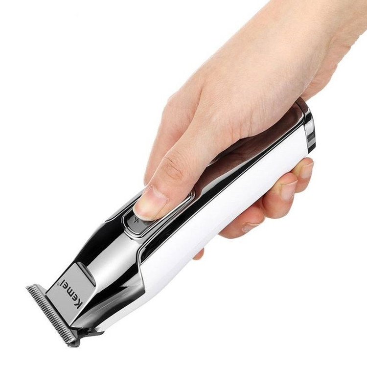 ماشین اصلاح موی سر و صورت کیمی مدل 5027 با باتری قابل شارژ 270 دقیقهای، سرعت موتور 7000 RPM، 4 حالت تنظیم سرعت، 3 عدد شانه قابل تنظیم و نمایشگر وضعیت باتری