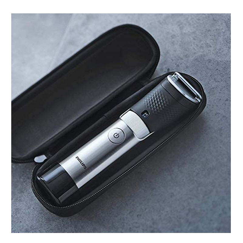ماشین اصلاح موی صورت فیلیپس مدل BT9810/13 با تیغه استیل ضدزنگ، فناوری PowerAdapt Sensor، استفاده خشک و مرطوب، ضد آب، شانه فلزی قابل تنظیم، باتری لیتیوم یونی با شارژ سریع 60 دقیقه و زمان استفاده 120 دقیقه، طراحی ارگونومیک و منبع انرژی برق و باتری