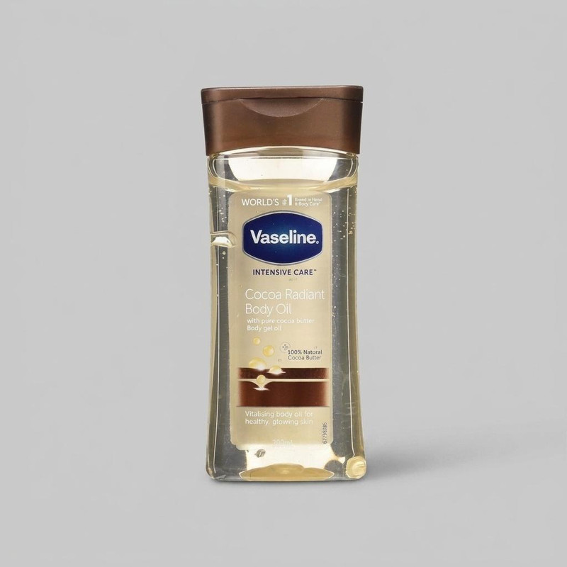 روغن بدن وازلین مدل Cocoa Butter حجم 200 میلی‌لیتر حاوی کره کاکائو خالص، ترمیم‌کننده پوست خشک و حساس، جذب سریع، حفظ رطوبت و ایجاد حس بدون چربی