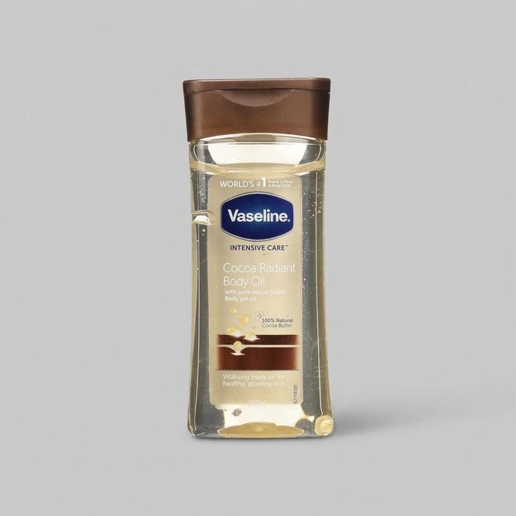 روغن بدن وازلین مدل Cocoa Butter حجم 200 میلیلیتر حاوی کره کاکائو خالص، ترمیمکننده پوست خشک و حساس، جذب سریع، حفظ رطو...